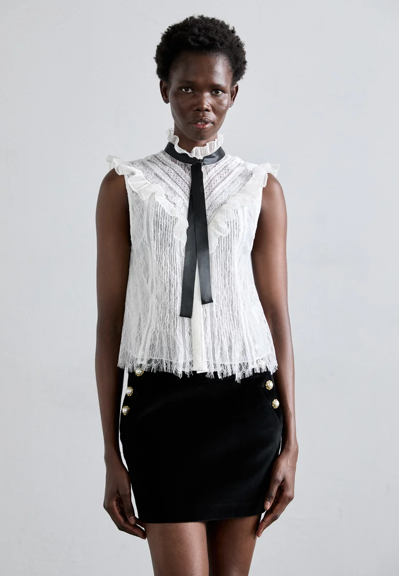 ever-popular Alice + Olivia RHEBA MOCK RUFFLE BLOUSE BOW - Top off white Clothing Shirts & Blouses Blouses