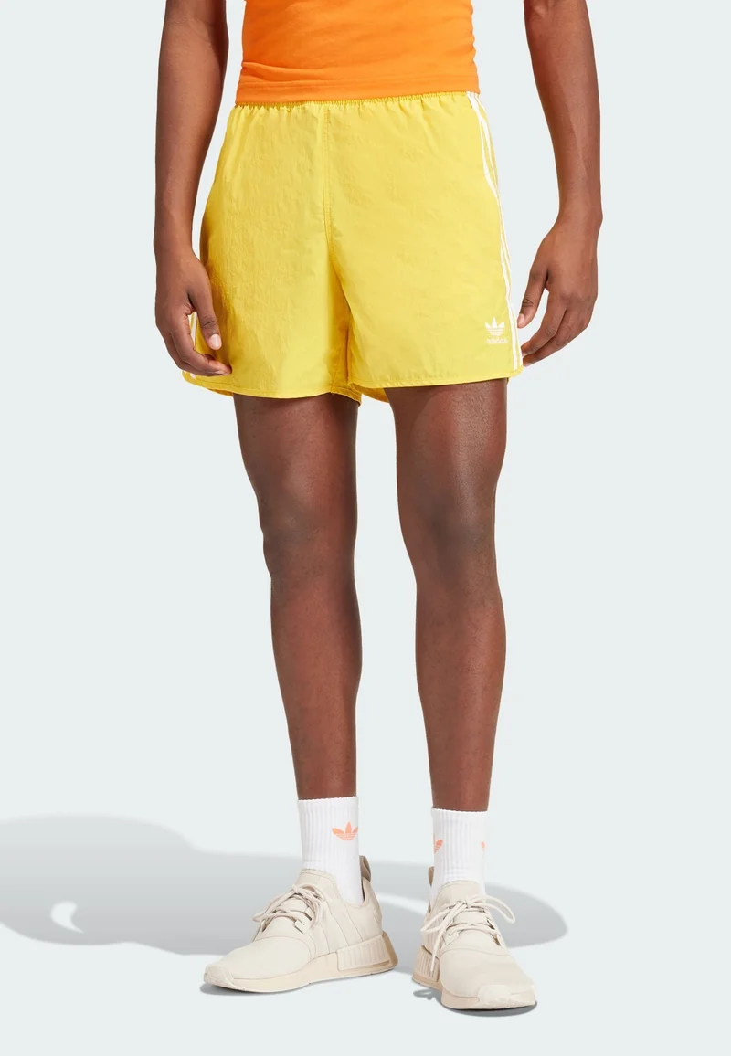 largest collection adidas Originals SPRINTER - Tracksuit bottoms bold gold Clothing Shorts Casual Shorts