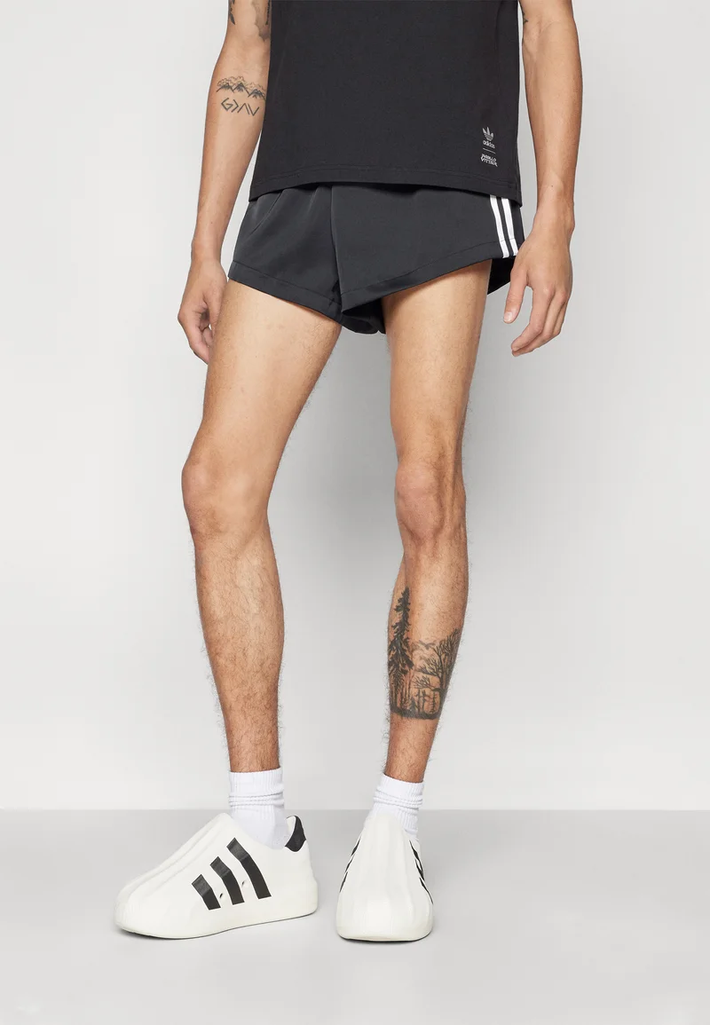 luxurious Collection adidas Originals PRIDE TREFOIL - Tracksuit bottoms black Streetwear Sale Streetwear Clothing Swimwear Casual Shorts