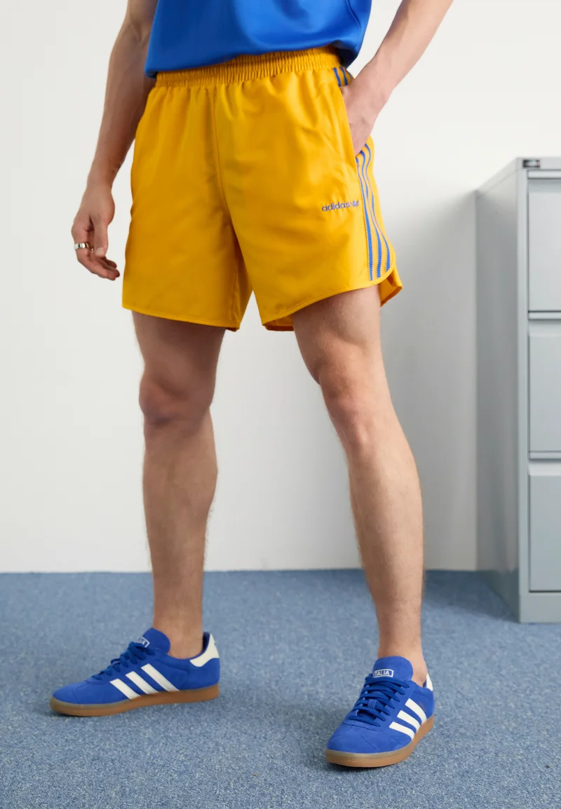 prestigious adidas Originals FOOTBALL - Tracksuit bottoms crew yellow Streetwear Sale Streetwear Clothing Swimwear Casual Shorts
