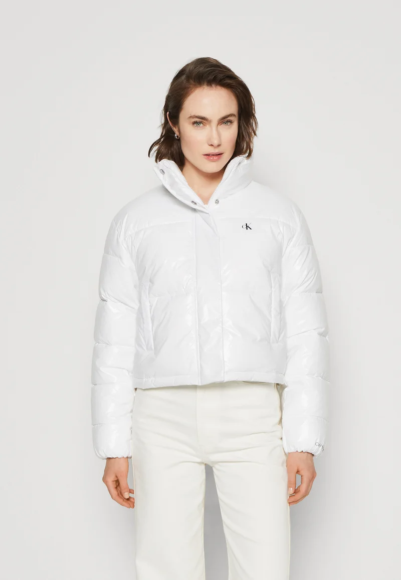 premium selection Calvin Klein Jeans CROPPED SHINY PUFFER - Winter jacket bright white Clothing Jackets & Blazers Bomber Jackets