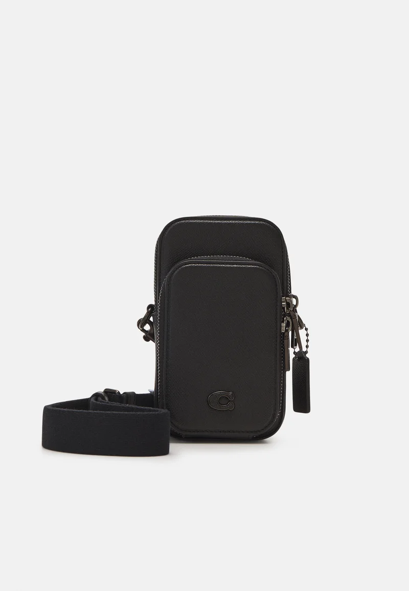 multiple colors COACH PHONE CROSSBODY IN CROSSGRAIN UNISEX - Phone case black Accessories Lifestyle Electronics Cases & Covers