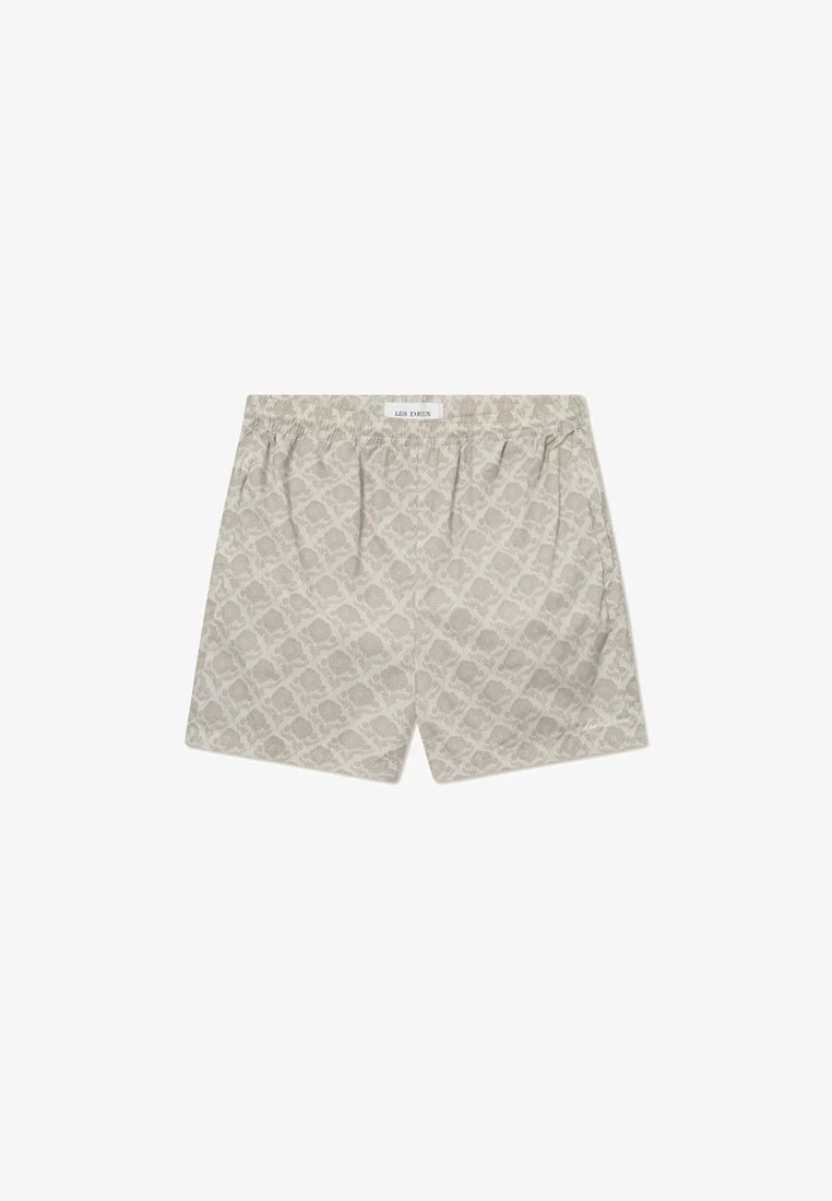 classic fashion trend Les Deux FLOWER TILE TRACK - Shorts light sand/dark sand Clothing Casual Shorts