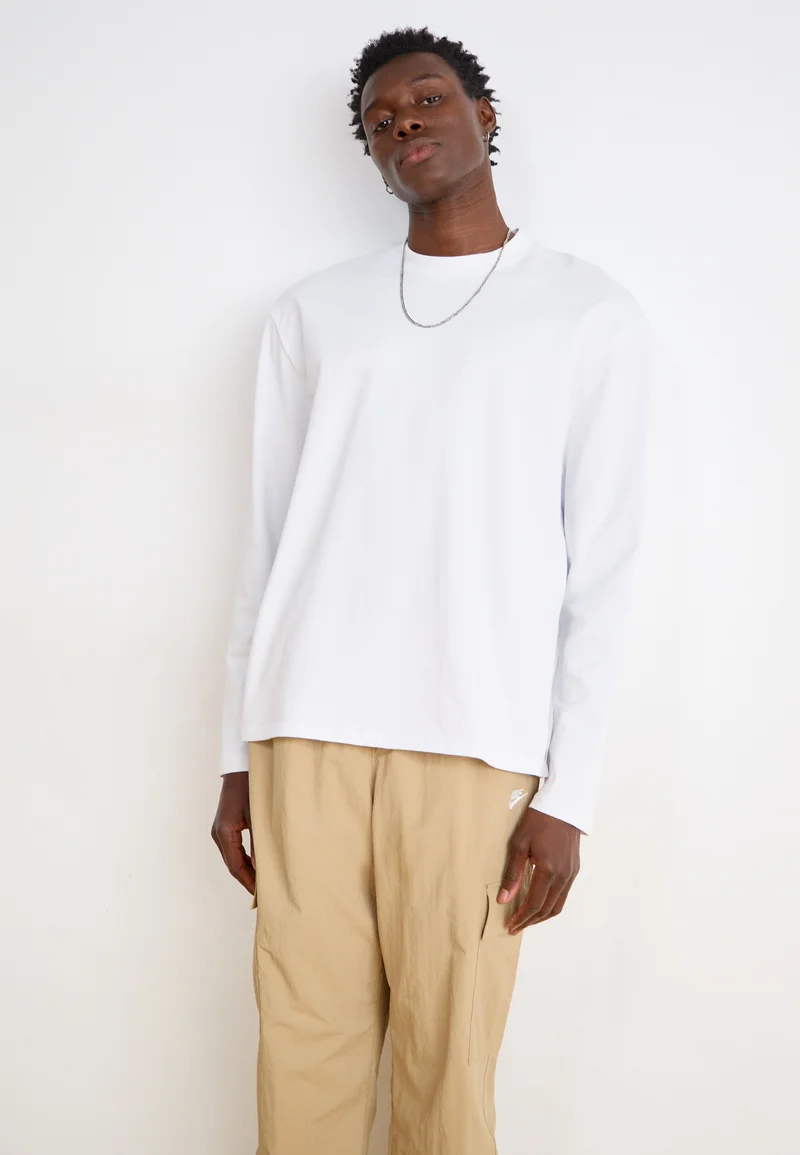 retail prices Nike Sportswear CLUB PANT - Cargo trousers beige Clothing Trousers Cargo trousers