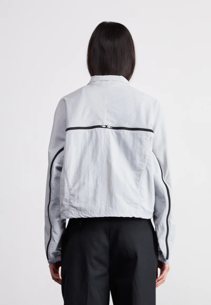 Online Here Puma DARE TO OVERSIZED ZIP-OFF JACKET - Summer jacket flat light gray Streetwear Clothing Jackets, Gilets & Blazers Bomber Jackets