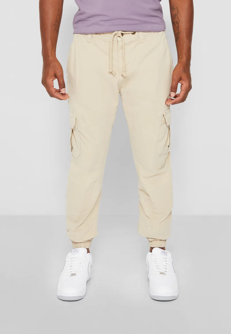 Elegant Factory Outlet Urban Classics CARGO JOGGING PANTS - Cargo trousers sand Clothing Trousers Cargo trousers