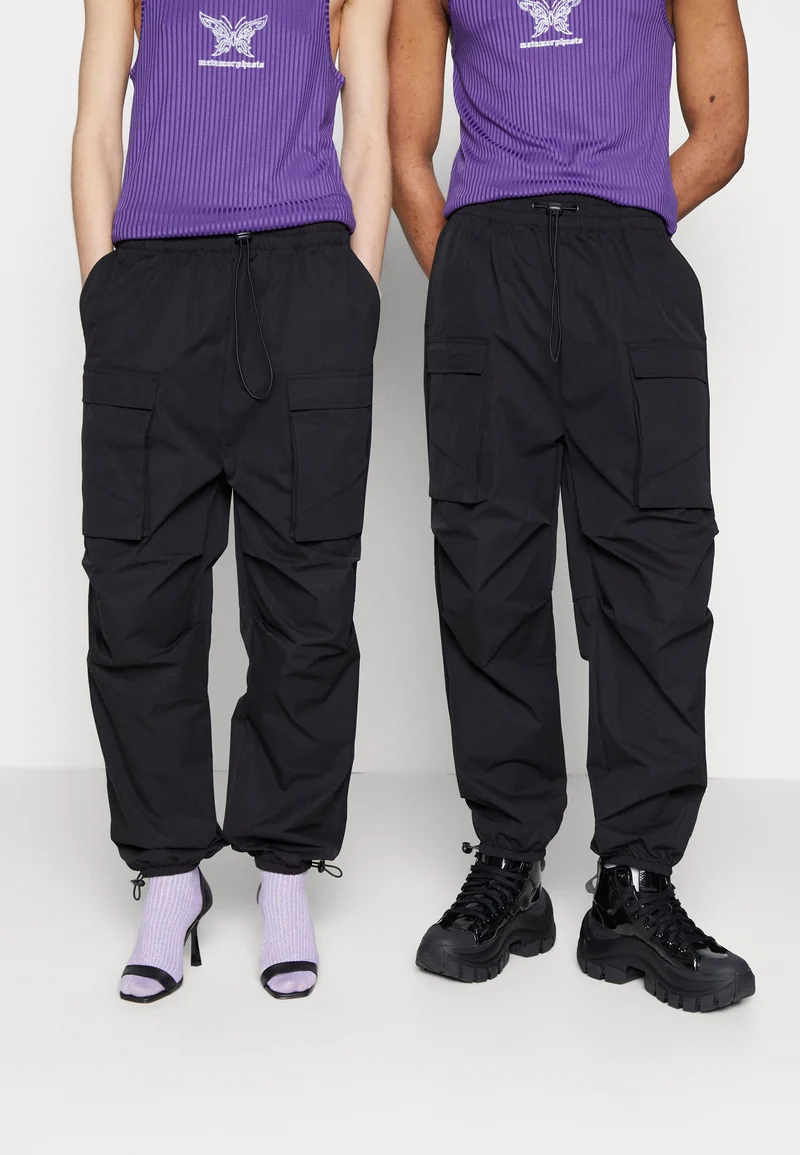 professional online store YOURTURN UNISEX - Cargo trousers black Clothing Trousers Cargo Trousers